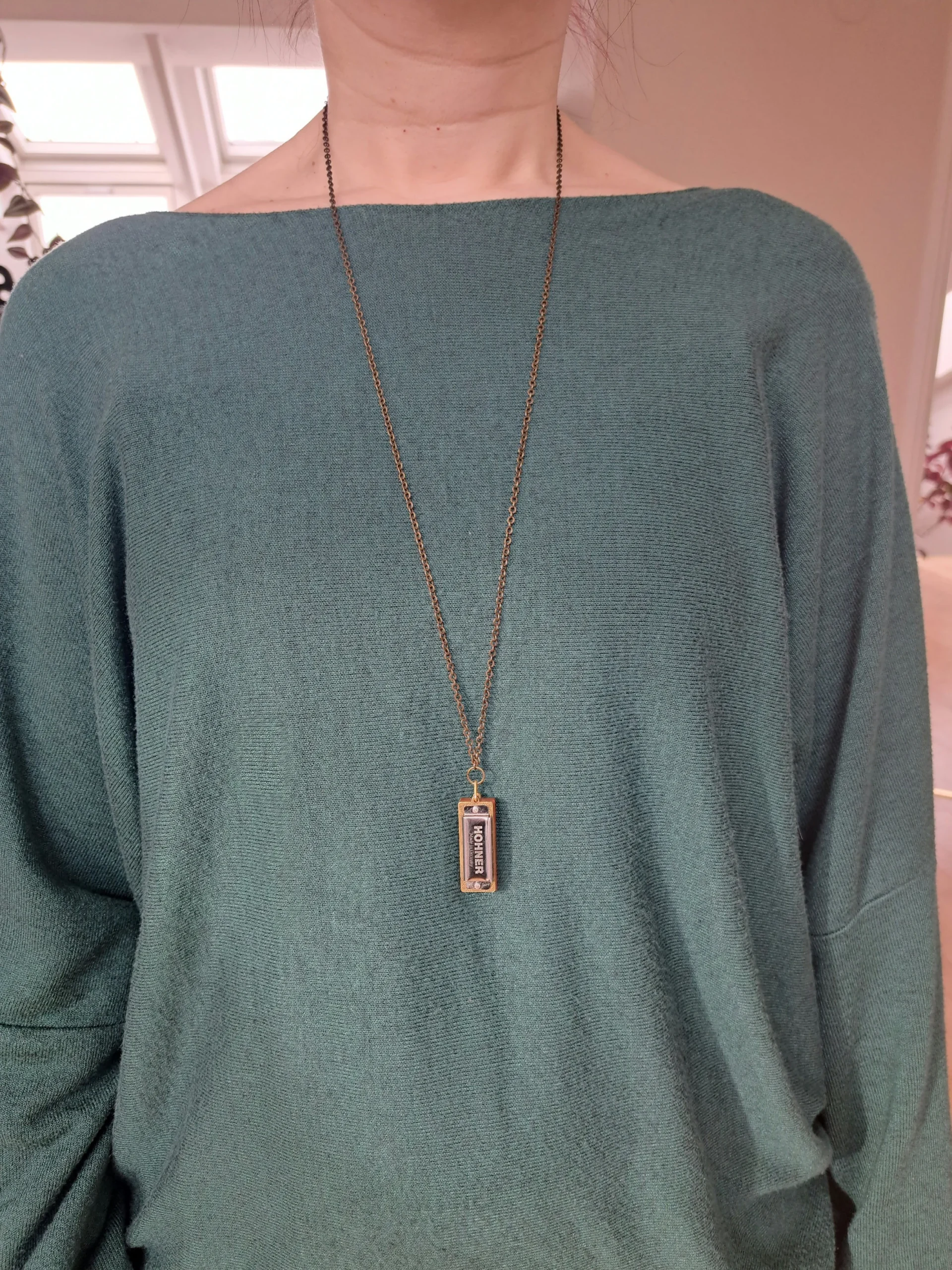 Harmonica Necklace Wearing 1
