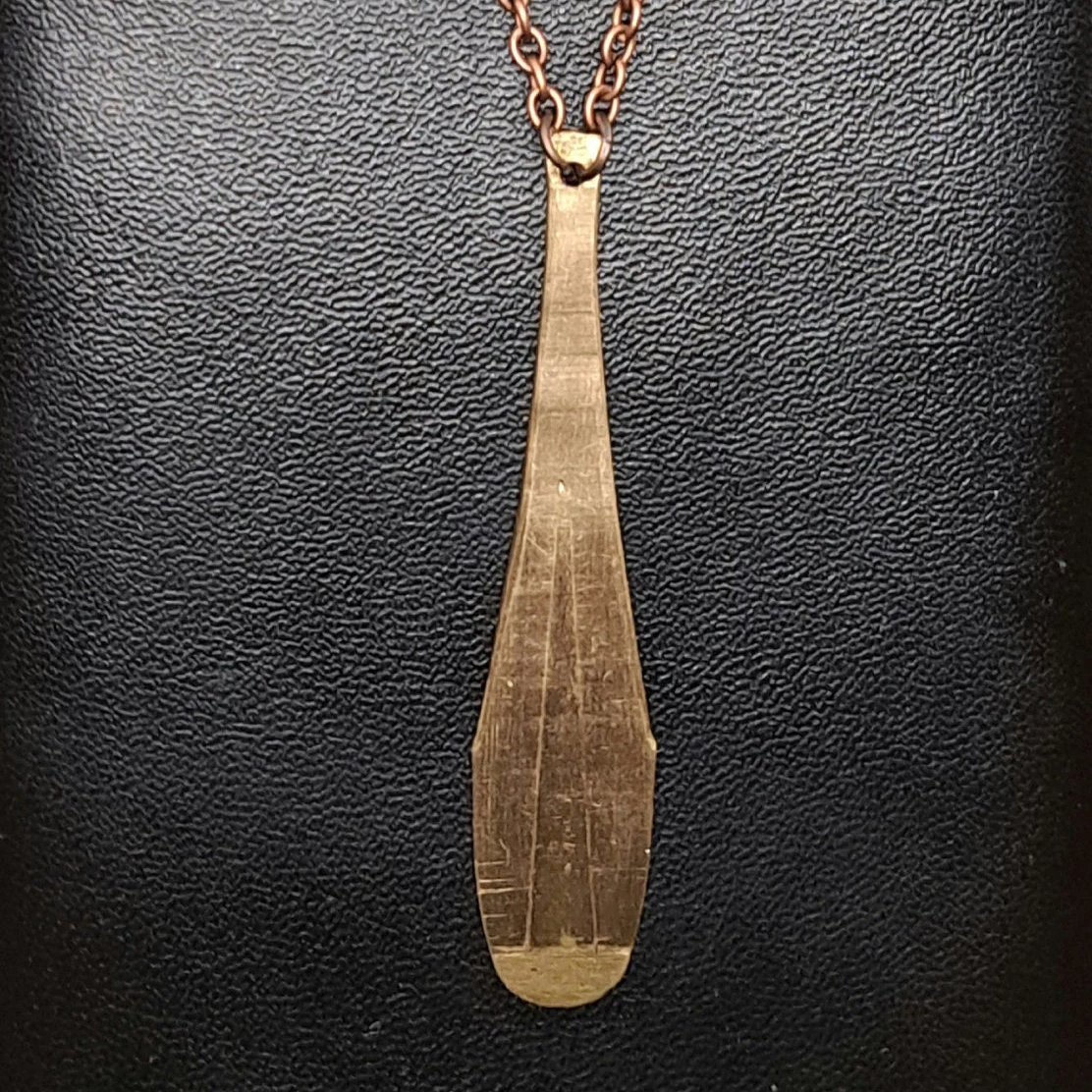 Handmade Jaw Harp Necklace featuring a playable bronze jaw harp on a 70 cm chain