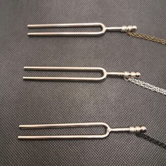 Tuning fork necklaces with bronze, silver, and black chains