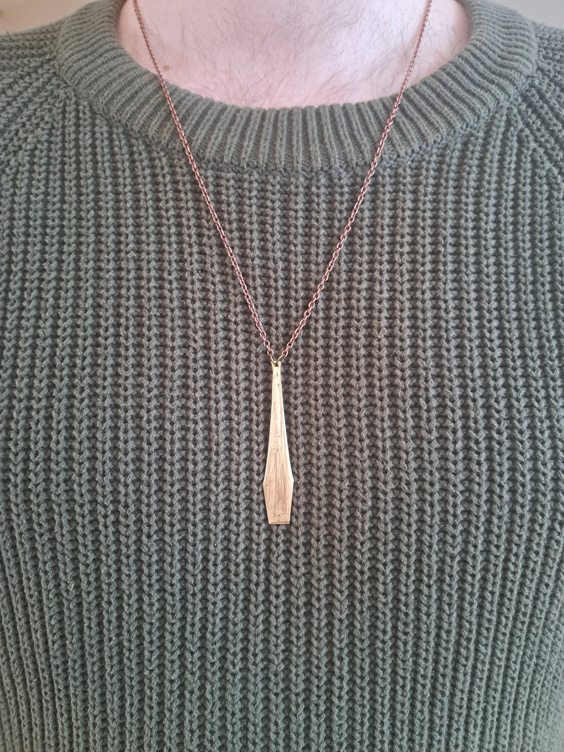 Jaw Harp Necklace Wearing 1